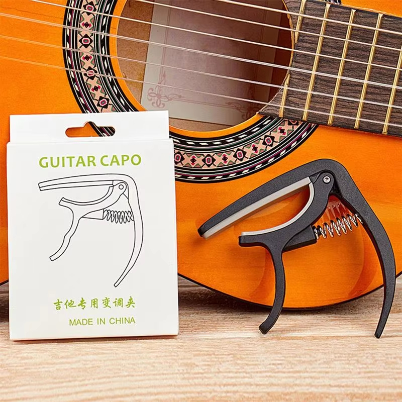 Przenośny plastikowy kapodaste – Guitar Capo Clip recenzja i cena